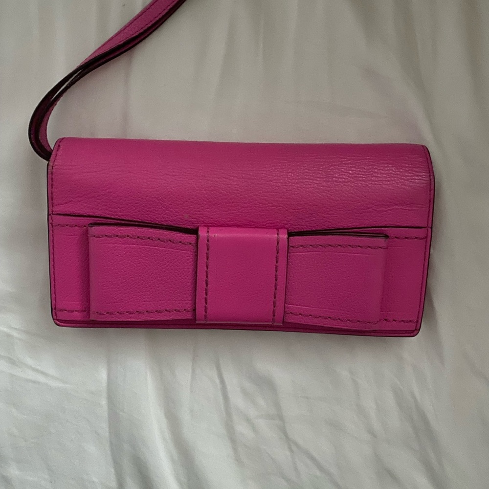Kate Spade pink wristlet wallet with bow
